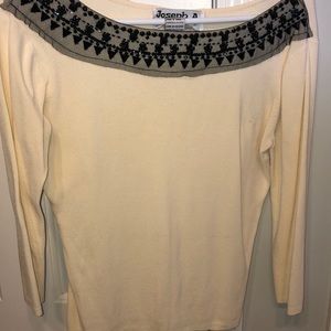 Creme top with black embellishments